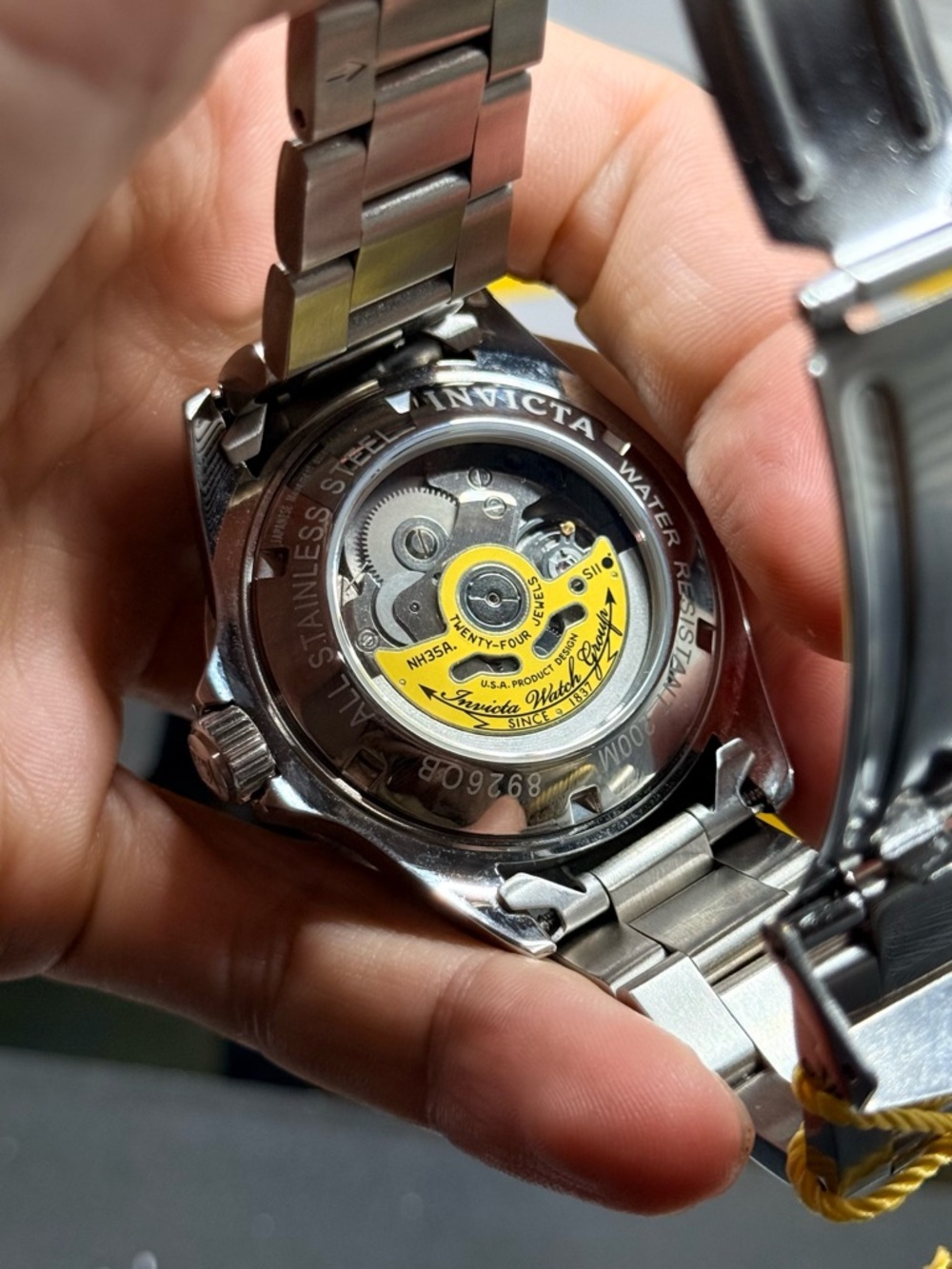 Invicta Stainless Steel Watch with Yellow Rotor Accent